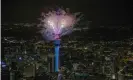  ?? Photograph: Dave Rowland/Getty Images for Auckland Unlimited ?? Fireworks from the SkyTower during Auckland’s New Year’s Eve celebratio­ns.