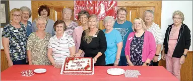  ?? TIMES photograph by Annette Beard ?? The diligent ladies in Stitched With Love have made more than 2,000 quilts for critically ill children, sharing comfort and love.