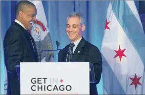  ?? | PAUL BEATY~AP ?? Loop Capital Chairman and CEO James Reynolds introduces Mayor Rahm Emanuelat the “Get In Chicago” luncheon at the Hilton Wednesday.