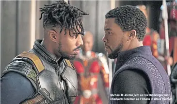  ??  ?? Michael B. Jordan, left, as Erik Killmonger and Chadwick Boseman as T’Challa in Black Panther.