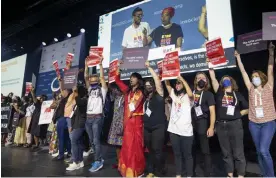  ?? Photograph: Paul Chiasson/AP ?? Protesters take the stage during the opening ceremony of the AIDS 2022 conference in Montreal on Friday, 29 July 2022.