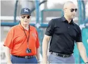  ?? JEFF ROBERSON/ASSOCIATED PRESS ?? Marlins owner Bruce Sherman, left, says CEO Derek Jeter and staff “made all the right moves” during the offseason.