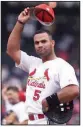  ?? (AP file photo) ?? Albert Pujols tips his cap to the fans on this date in 2001 after driving in three runs to set a new National League rookie record with 120 RBI in the St. Louis Cardinals’ 8-2 victory over the Milwaukee Brewers at Busch Stadium in St. Louis.