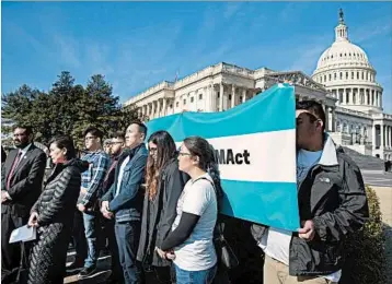  ?? MICHAEL REYNOLD/EPA ?? Young immigrants with Democratic Texas Rep. Al Green, from left, and California Rep. Judy Chu demand a fix to DACA.