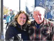  ?? SAMANTHA WILDOW / STAFF ?? Katy Hazen, left, who was visiting from Kansas City and is a Springfiel­d native, poses with Jack Lilienthal, of Springfiel­d. Hazen and Lilienthal were in downtown Dayton on Sunday after leaving St. Joseph Catholic Church, 411 E. Second St.