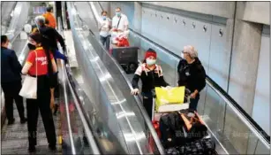 ?? Photo: Bangkok Post / file ?? Tourists arriving at Suvarnabhu­mi airport on Dec 17, when Test & Go was still an option for air travellers.