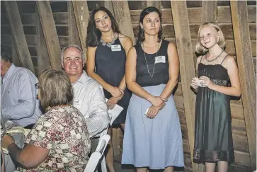  ?? BY E. RAYMOND BOC ?? Cierra Chambers (left) waits to speak at the Taste of Rappahanno­ck fundraiser Sept. 10 with Next Step program manager Kat Habib and Rappahanno­ck student Maeve Ciuba.