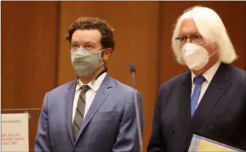  ?? Lucy Nicholson/Pool Photo via AP ?? Actor Danny Masterson (left) stands with his attorney, Thomas Mesereau as he is arraigned on rape charges at Los Angeles Superior Court, in Los Angeles, Calif. on Friday.