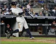  ?? FRANK FRANKLIN II — THE ASSOCIATED PRESS FILE ?? In this file photo, New York Yankees’ Aaron Judge hits a three-run home run during the fourth inning of a baseball game against the Baltimore Orioles, in New York. Nearly two decades after the height of the Steroids Era, Major League Baseball is on...