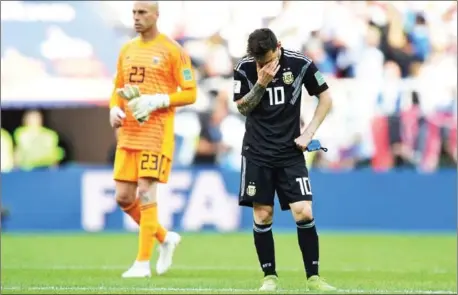  ?? JUAN MABROMATA/AFP ?? Argentina’s forward Lionel Messi reacts at the end of their Russia 2018 World Cup Group D football match against Iceland at the Spartak Stadium in Moscow on Saturday.