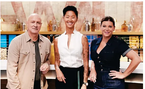  ?? Photos: Bravo/TNS, Getty Images ?? New Top Chef host Kristen Kish (centre) with judges Tom Colicchio and Gail Simmons in Season 21 of the show.