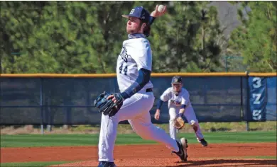  ?? Mike Johnson ?? Berry sophomore Patrick O’rourke throws a pitch during a game vs. Millsaps College on Saturday, March 6, in Rome. O’rourke threw Berry’s first perfect game in nearly 50 years.