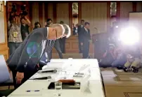  ?? Reuters ?? Tetsuo Yukioka (L), Managing Director of Tokyo Medical University and Keisuke Miyazawa, Vice-President of Tokyo Medical University, bow as they attend a news conference in Tokyo. —