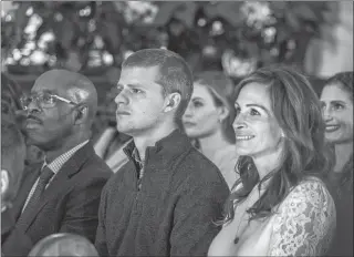  ?? AP PHOTO ?? This image released by Roadside Attraction­s shows, from left, Courtney B. Vance, Lucas Hedges and Julia Roberts in a scene from “Ben is Back.”