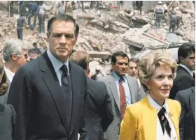  ?? Bob Daugherty / Associated Press 1985 ?? John Gavin (left), U.S. ambassador to Mexico, and first lady Nancy Reagan view damage in Mexico City on Sept. 24, 1985, after an 8.0-magnitude earthquake.