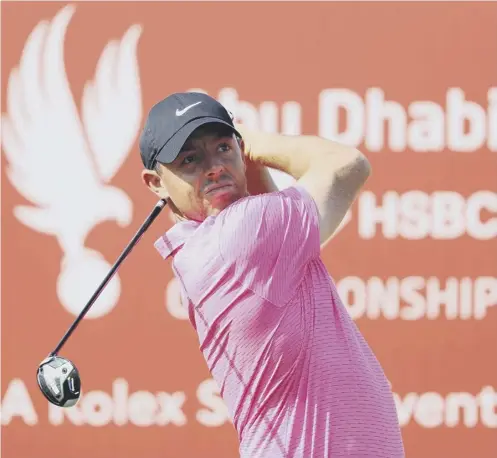  ??  ?? 0 Rory Mcilroy tees off on the sixth hole on his way to an eight-under-par 64 on day one of the Abu Dhabi HSBC Championsh­ip
