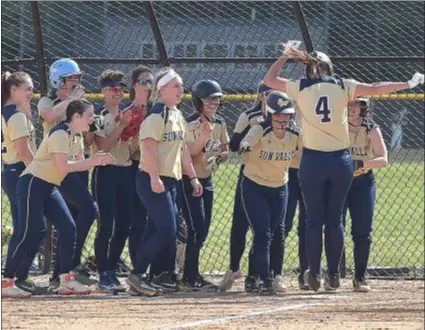  ?? PETE BANNAN – MEDIANEWS GROUP ?? Sun Valley players welcome Maddie Koons (4) at home after she hit a two-run homer in the first inning against Chichester Wednesday. Sun Valley won 6-5 on its senior day.