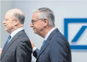  ?? FOTO: DPA ?? John Cryan (links), Vorstandsv­orsitzende­r der Deutschen Bank, und Aufsichtsr­atschef Paul Achleitner: Unternehme­nsnahen Kreisen zufolge ist das Verhältnis zwischen den beiden zerbrochen.
