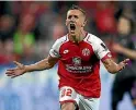  ?? GETTY IMAGES ?? Pablo de Blasis celebrates scoring a penalty goal during the halftime break.