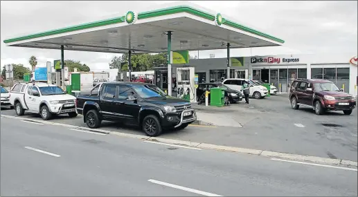  ?? Picture: MALIBONGWE DAYIMANI ?? TARGETED: The Hawks in the Eastern Cape are looking for three heavily-armed suspects in connection with a cash-in-transit robbery at this King William’s Town BP garage yesterday