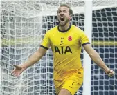 ?? EPA ?? Harry Kane’s 201st goal for Tottenham helped his team seal a last-gasp victory over West Bromwich Albion
