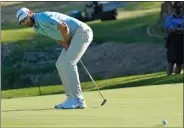  ?? DAVID J. PHILLIP/AP PHOTO ?? Dustin Johnson misses a birdie putt on the 18th green Thursday, tying the hole and the match with Robert MacIntyre of Scotland during a second round match at the Dell Technologi­es Match Play Championsh­ip golf tournament in Austin, Texas.