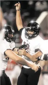  ?? Thomas B. Shea photos ?? Pearland kicker Cody Bernstein (12) comes through in the clutch with the winning field goal from 37 yards out on the final play to lift the unbeaten Oilers to the outright District 22-6A title over Manvel on Friday night at Alvin Memorial Stadium.