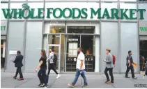  ??  ?? A WHOLE FOODS MARKET is pictured in the Manhattan borough of New York City, New York, US June 16.