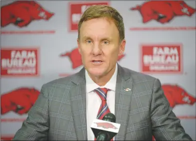  ?? Associated Press ?? Discussing matters: Arkansas coach Chad Morris speaks Wednesday during a press conference in the Fred Smith Football Center on the university campus in Fayettevil­le.