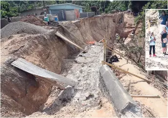  ?? PHOTOS BY RICARDO MAKYN/MULTIMEDIA PHOTO EDITOR ?? Work is in progress to restore the roadway in Mount Ogle, Lawrence Tavern, but the residents say it is slow and they are concerned about their safety and that of their children.