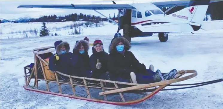  ?? KATRINA bengaard ?? An all-female medical crew from Alaska’s Maniilaq Health Center travelled by sled to deliver the COVID-19 vaccine to the isolated Alaskan village of Shungnak in December.