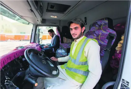  ?? Christophe­r Pike / The National ?? Pakistani driver Omar Ayaz worries about the unpredicta­ble and dangerous road behaviour of other motorists.