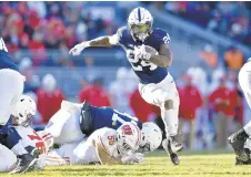  ?? ABBY DREY/CENTRE DAILY TIMES ?? Penn State running back Miles Sanders rushed for 159 yards Saturday to top 1,000 for the season.