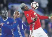  ?? REUTERS ?? Manchester United's Paul Pogba in action as Chelsea's Willian and Victor Moses look on.