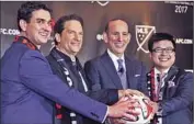 ?? Nick Ut Associated Press ?? MLS COMMISSION­ER Don Garber, second from right, and three of the Los Angeles Football Club’s owners, Tom Penn, Peter Guber and Henry Nguyen, from left, at October event announcing team.