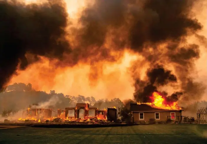  ??  ?? Flames erupt during the Kincade fire near Geyservill­e, California. Photograph: Josh Edelson/AFPvia Getty Images