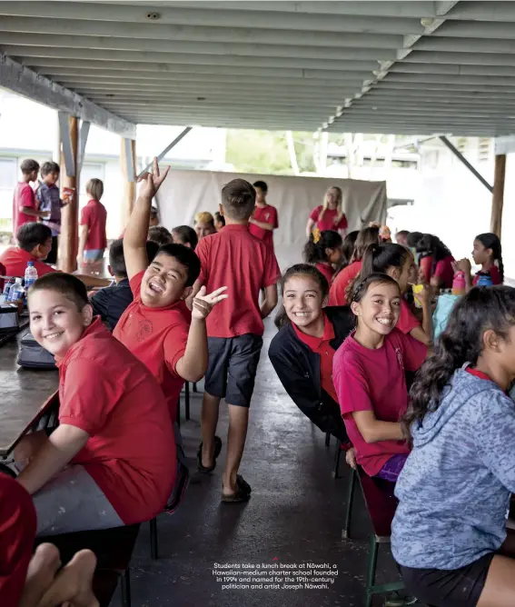  ??  ?? Students take a lunch break at Nāwahī, a Hawaiian-medium charter school founded in 1994 and named for the 19th-century
politician and artist Joseph Nāwahī.