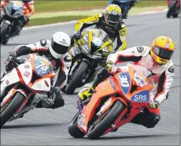  ?? Pictures: Simon Hildrew ?? Above: Sittingbou­rne’s Rob McNealy, No.30, took part in two Superstock 1000 races at Brands, with a 21st place and a retirement Left: Louis Valleley, No.4, from Maidstone, finished 18th in the Superstock 600 race. Right: Luke Mossey, No.12, won both Superbike races