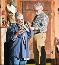  ?? STACI VANDAGRIFF/THREE RIVERS EDITION ?? Shown in this rehearsal scene of On Golden Pond are Nancy Liles and Jeff Pulliam as Ethel and Norman Thayer, an elderly couple who once again spend their summer at a family cabin as they have for the past 47 years. The play opens Friday evening at Center on the Square in Searcy.