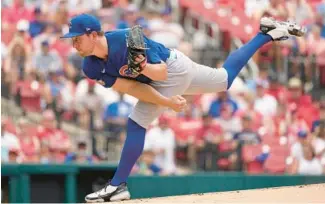  ?? JEFF ROBERSON/AP ?? Cubs starter Adrian Sampson delivers during the first inning Saturday in St. Louis.