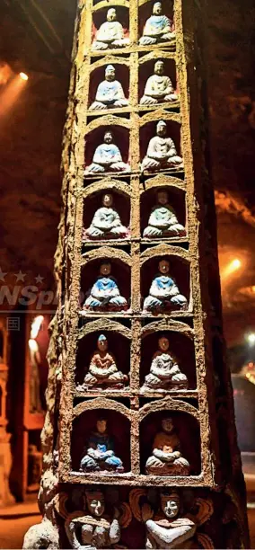  ??  ?? Les grottes des Dix Mille Bouddhas, dans la zone touristiqu­e de la colline Qianfo, le 29 décembre 2017, à Jinan