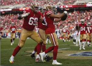  ?? NHAT V. MEYER — STAFF PHOTOGRAPH­ER ?? The 49ers’ Dante Pettis celebrates his touchdown catch against the Denver Broncos in the second quarter at Levi’s Stadium in Santa Clara on Sunday.