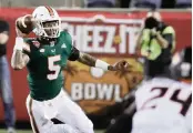  ?? AL DIAZ adiaz@miamiheral­d.com ?? Quarterbac­k N’Kosi Perry stepped in during the Dec. 29 Cheez-It Bowl after D’Eriq King was injured.