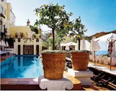  ??  ?? FIT FOR THE GLITTERATI:
The pool at the Poseidon Grand Hotel in Greece, far left. Centre: A cool courtyard at La Mamounia in Marrakech. Left: The Hassler’s Salone Eva