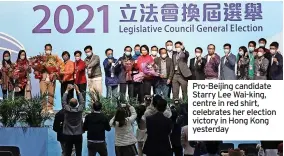  ?? ?? Pro-Beijing candidate Starry Lee Wai-king, centre in red shirt, celebrates her election victory in Hong Kong yesterday