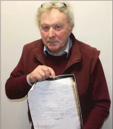  ??  ?? Tom Wall with a document relating to his own time in the Christian Brothers’ industrial school in Glin. It records his birth status as ‘illegitima­te’; his family’s ‘destitutio­n’ as the reason for his admittance at just three years of age and his...