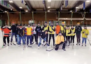  ??  ?? HAT(FIELD) TRICK
As part of the company's efforts to build morale, employees at Hatfield Consultant­s gather for an annual hockey game