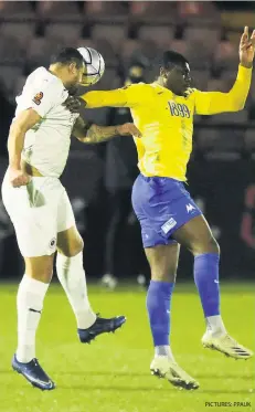  ?? PICTURES: PPAUK ?? Adam Lewis celebrates a debut goal for Plymouth Argyle last night (left), Archie Collins captains Exeter at Harrogate (centre) and Torquay’s Josh Umerah challenges for the ball at Boreham Wood