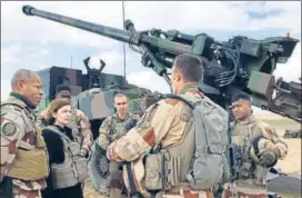  ?? AFP ?? French defence minister Florence Parly (2nd L) talks to French soldiers engaged in the Operation Chammal, which is part of the Operation Inherent Resolve, the internatio­nal coalition against the Islamic State near Al-qaim, a few kilometres away from the last scrap of territory held by IS in east Syria.