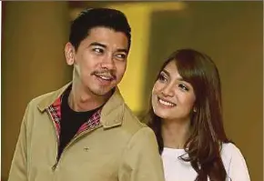  ??  ?? Actor Amar Baharin with his actress wife, Amyra Rosli.